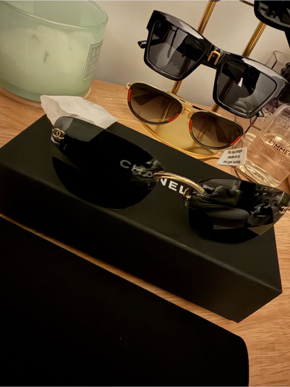 CHANEL Black Frame Sunglasses with Dark Lenses